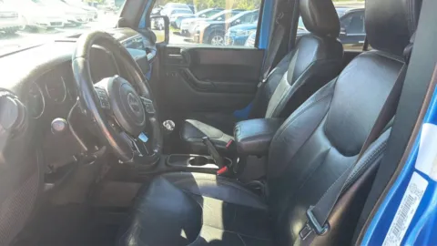 More photos of 2014 Jeep Wrangler Unlimited Altitude Sport Utility 4D at JT Wholesale Auto, Inc., OK