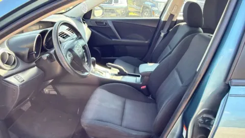 Photos of 2010 MAZDA MAZDA3 i Sport Sedan 4D for sale in Broken Arrow, OK at JT Wholesale Auto, Inc.