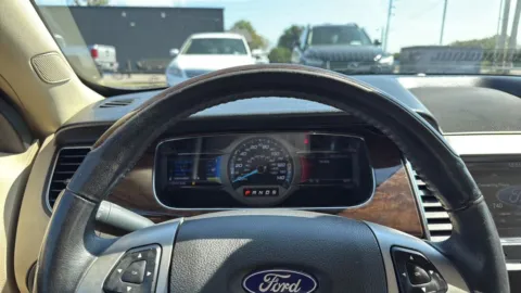 Photos of 2013 Ford Taurus Limited Sedan 4D for sale in Broken Arrow, OK at JT Wholesale Auto, Inc.
