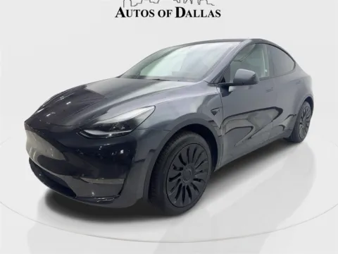 Photos of 2025 Tesla Model Y Long Range NAV,CAM,PANO,HTD STS,BLIND SPOT,19" WLS for sale in Irving, TX at Autos of Dallas - Irving