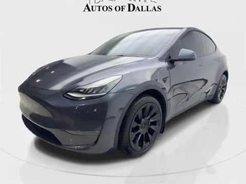 Photos of 2021 Tesla Model Y Long Range NAV,CAM,PANO,HTD STS,BLIND SPOT,20" WLS for sale in Irving, TX at Autos of Dallas - Irving