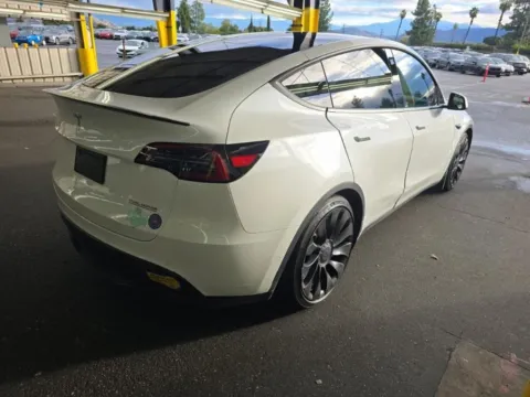 Photos of 2022 Tesla Model Y Performance NAV,CAM,PANO,HTD STS,BLIND SPOT,21" WL for sale in Irving, TX at Autos of Dallas - Irving