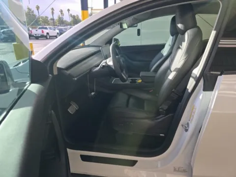 More photos of 2022 Tesla Model Y Performance NAV,CAM,PANO,HTD STS,BLIND SPOT,21" WL at Autos of Dallas - Irving, TX