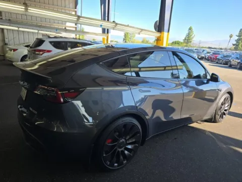 Photos of 2023 Tesla Model Y Performance NAV,CAM,PANO,HTD STS,BLIND SPOT,21" WL for sale in Irving, TX at Autos of Dallas - Irving