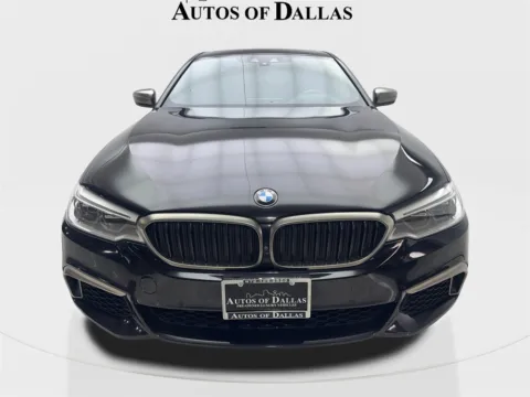 Another view of 2020 BMW 5 Series M550i xDrive for sale in Irving, TX at Autos of Dallas - Irving