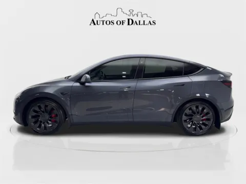 More photos of 2023 Tesla Model Y Performance NAV,CAM,PANO,HTD STS,BLIND SPOT,21" WL at Autos of Dallas - Irving, TX