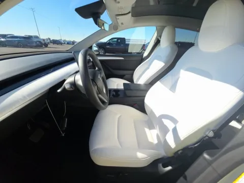 More photos of 2025 Tesla Model Y Long Range NAV,CAM,PANO,HTD STS,BLIND SPOT,20" WLS at Autos of Dallas - Irving, TX