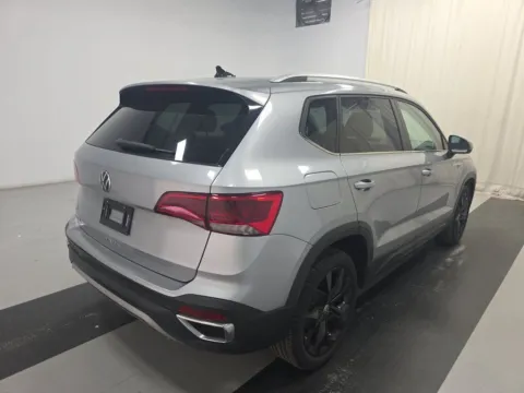 Photos of 2022 Volkswagen Taos 1.5T SE CAM,PANO,HTD STS,BLIND SPOT,18" WLS for sale in Irving, TX at Autos of Dallas - Irving