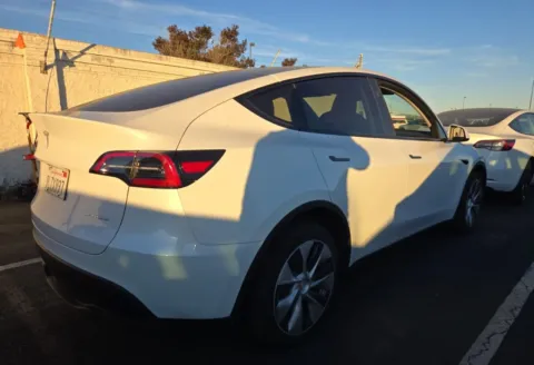 Photos of 2024 Tesla Model Y Long Range NAV,CAM,PANO,HTD STS,BLIND SPOT for sale in Irving, TX at Autos of Dallas - Irving