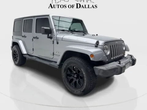 Photos of 2018 Jeep Wrangler JK Unlimited Sahara for sale in Irving, TX at Autos of Dallas - Irving