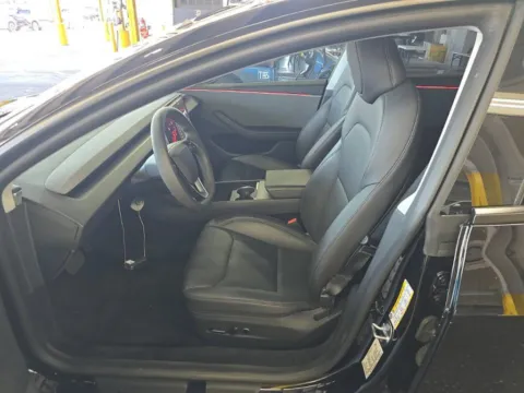 More photos of 2025 Tesla Model 3 Long Range at Autos of Dallas - Irving, TX