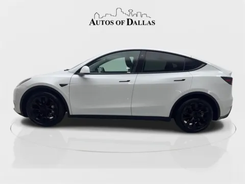 More photos of 2022 Tesla Model Y Long Range NAV,CAM,PANO,HTD STS,BLIND SPOT,20" WLS at Autos of Dallas - Irving, TX