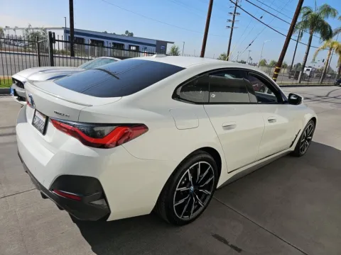 Photos of 2022 BMW i4 eDrive40 M SPORT,NAV,CAM,SUNROOF,HTD STS,BLIND SPO for sale in Plano, TX at Autos of Dallas - Plano