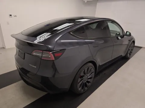 Photos of 2024 Tesla Model Y Performance NAV,CAM,PANO,BLIND SPOT,21" WHLS for sale in Plano, TX at Autos of Dallas - Plano