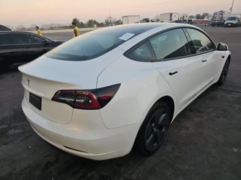 Photos of 2023 Tesla Model 3 NAV,CAM,PANO,HTD STS,BLIND SPOT,18" WLS for sale in Plano, TX at Autos of Dallas - Plano