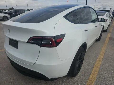 Photos of 2025 Tesla Model Y Long Range NAV,CAM,PANO,HTD STS,BLIND SPOT,19" WLS for sale in Plano, TX at Autos of Dallas - Plano