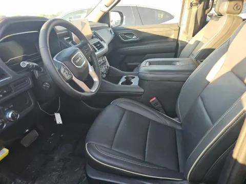 More photos of 2024 GMC Yukon SLT NAV,CAM,CLMT STS,BLIND SPOT,22" WLS,3RD ROW at Autos of Dallas - Plano, TX