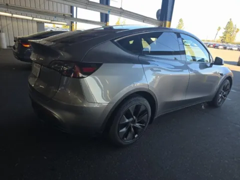 Photos of 2025 Tesla Model Y Long Range NAV,CAM,PANO,HTD STS,BLIND SPOT,19" WLS for sale in Plano, TX at Autos of Dallas - Plano