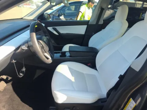 More photos of 2021 Tesla Model Y Standard Range NAV,CAM,PANO,HTD STS,BLIND SPOT at Autos of Dallas - Plano, TX