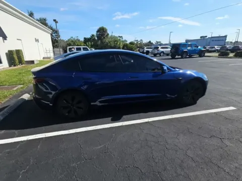 Photos of 2025 Tesla Model 3 NAV,CAM,PANO,HTD STS,BLIND SPOT,18" WLS for sale in Plano, TX at Autos of Dallas - Plano