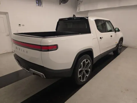 Photos of 2023 Rivian R1T Adventure NAV,CAM,PANO,CLMT STS,BLIND SPOT,22" WLS for sale in Plano, TX at Autos of Dallas - Plano