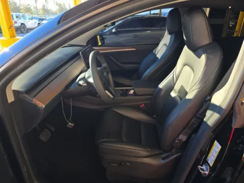 More photos of 2024 Tesla Model Y Standard Range NAV,CAM,PANO,HTD STS,BLIND SPOT at Autos of Dallas - Plano, TX