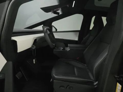 More photos of 2024 Tesla Cybertruck NAV,CAM,PANO,CLMT STS,BLIND SPOT,20" WLS at Autos of Dallas - Plano, TX