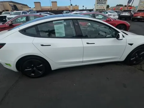 Photos of 2023 Tesla Model 3 NAV,CAM,PANO,HTD STS,BLIND SPOT for sale in Plano, TX at Autos of Dallas - Plano