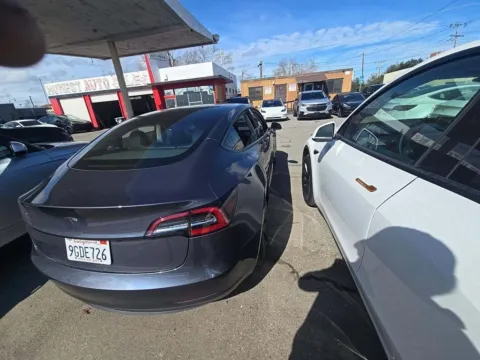 Photos of 2023 Tesla Model 3 NAV,CAM,PANO,HTD STS,BLIND SPOT,18" WLS for sale in Plano, TX at Autos of Dallas - Plano