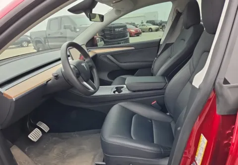 More photos of 2024 Tesla Model Y Performance NAV,CAM,PANO,HTD STS,21" WLS at Autos of Dallas - Plano, TX