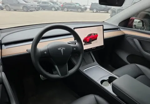 More photos of 2024 Tesla Model Y Performance NAV,CAM,PANO,HTD STS,21" WLS at Autos of Dallas - Plano, TX