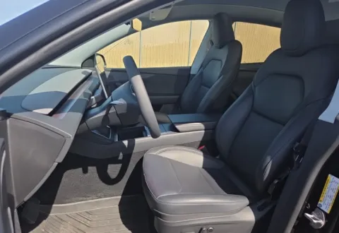 More photos of 2026 Tesla Model Y Long Range at Autos of Dallas - Plano, TX