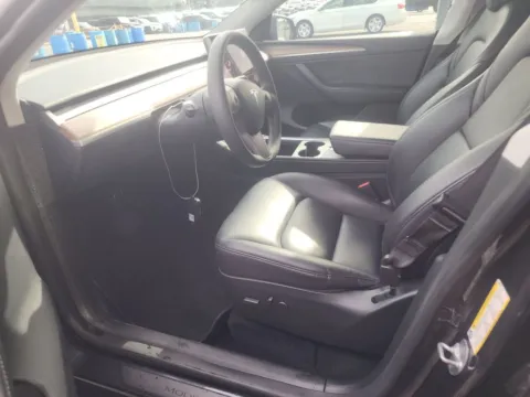 More photos of 2024 Tesla Model Y Standard Range at Autos of Dallas - Plano, TX