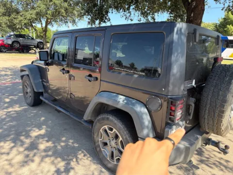Another view of 2013 Jeep Wrangler Unlimited Sport for sale in Plano, TX at Autos of Dallas - Plano