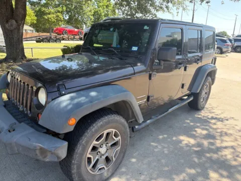 Photos of 2013 Jeep Wrangler Unlimited Sport for sale in Plano, TX at Autos of Dallas - Plano