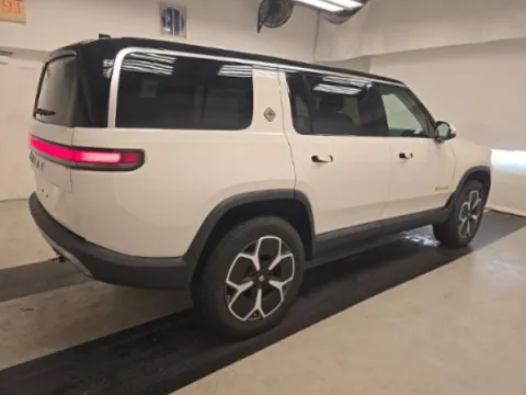 Photos of 2023 Rivian R1S Adventure Quad Motor Large Pack for sale in Plano, TX at Autos of Dallas - Plano