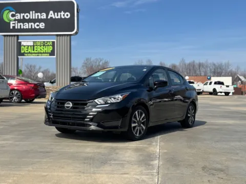 Black 2023 NISSAN VERSA SV for sale in Forest City, NC