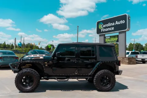 Another view of 2016 JEEP WRANGLER UNLIMI SPORT for sale in Forest City, NC at Carolina Auto Finance