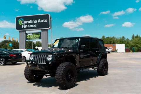 Black 2016 JEEP WRANGLER UNLIMI SPORT for sale in Forest City, NC