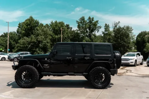 Another view of 2017 JEEP WRANGLER UNLIMI SAHARA for sale in Forest City, NC at Carolina Auto Finance