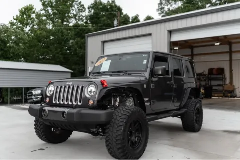 Gray 2017 JEEP WRANGLER UNLIMI SAHARA for sale in Forest City, NC