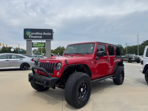 Red 2014 JEEP WRANGLER UNLIMI SPORT for sale in Forest City, NC