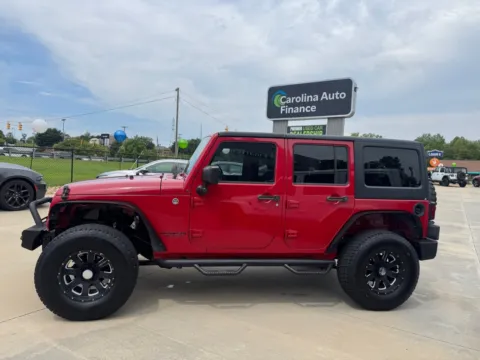 Another view of 2014 JEEP WRANGLER UNLIMI SPORT for sale in Forest City, NC at Carolina Auto Finance