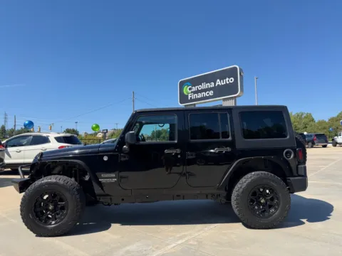 Another view of 2016 JEEP WRANGLER UNLIMI SPORT for sale in Forest City, NC at Carolina Auto Finance