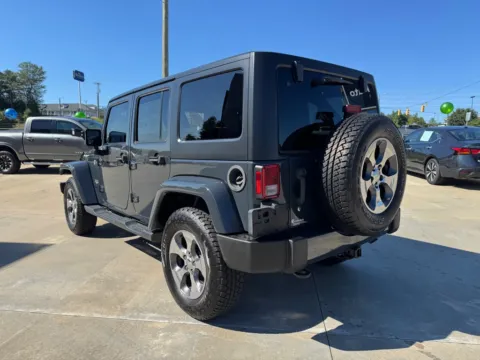 Another view of 2016 JEEP WRANGLER UNLIMI SAHARA for sale in Forest City, NC at Carolina Auto Finance