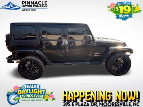 Photos of 2014 Jeep Wrangler Unlimited Sahara for sale in Mooresville, NC at Pinnacle Motor Company LKN