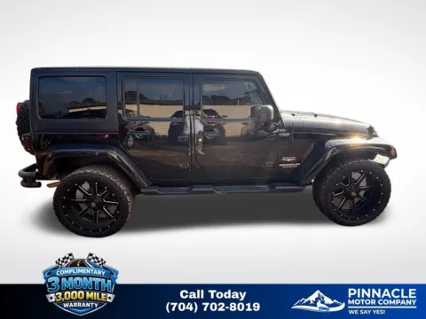 Another view of 2014 Jeep Wrangler Unlimited Sahara for sale in Mooresville, NC at Pinnacle Motor Company LKN