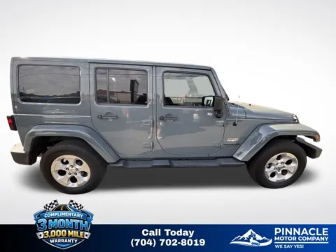 Another view of 2014 Jeep Wrangler Unlimited Sahara for sale in Mooresville, NC at Pinnacle Motor Company LKN