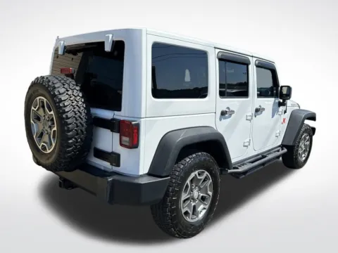 Another view of 2014 Jeep Wrangler Unlimited Rubicon for sale in Mooresville, NC at Pinnacle Motor Company LKN