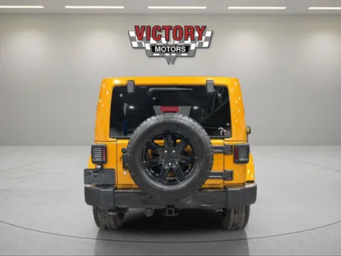 More photos of 2014 Jeep Wrangler Unlimited Sahara 4x4 4dr SUV at Victory Motors Lake Orion, MI